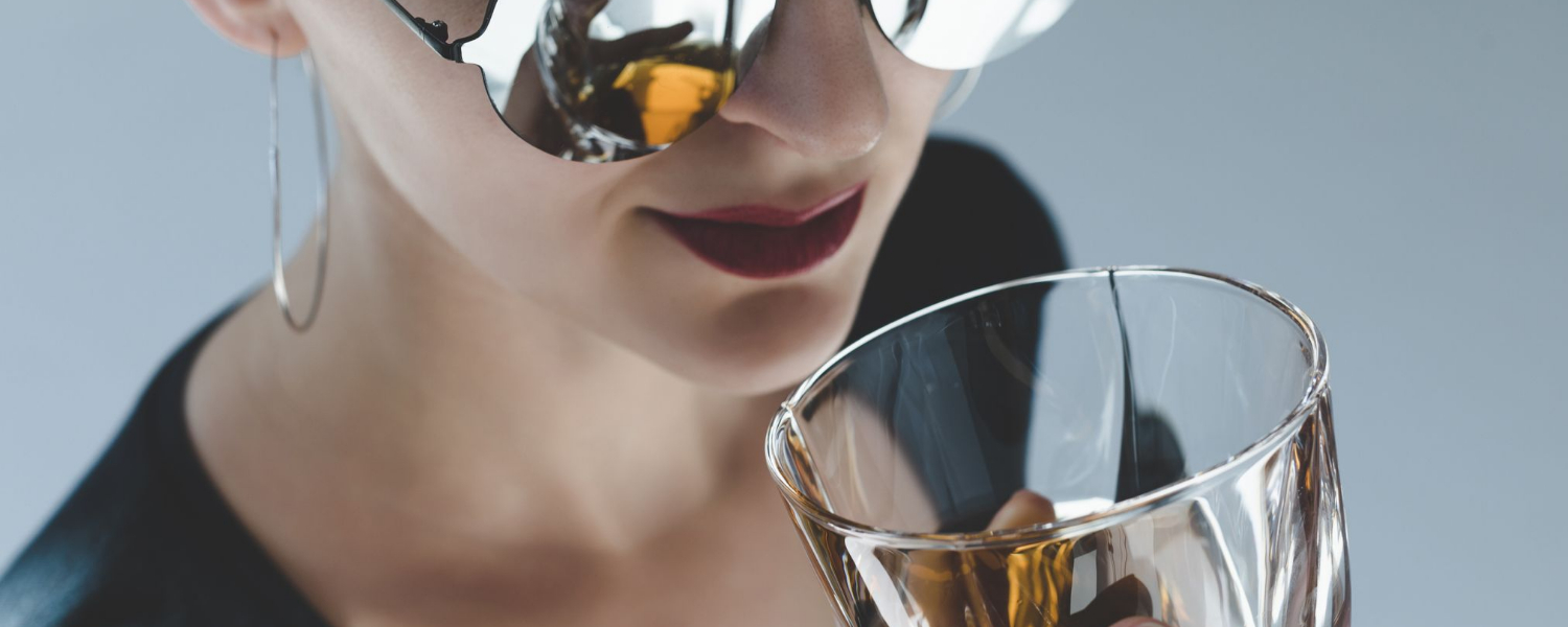 Woman drinking whisky
